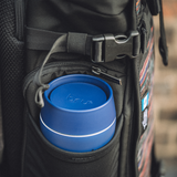 bru ceramic travel mug in blue planet in backpack side pocket
